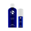 Two blue iS Clinical bottles with white caps labelled Cleansing Complex and Copper Firming Mist on white background