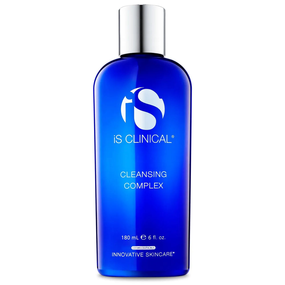 Blue bottle of iS Clinical Cleansing Complex with silver cap on white background