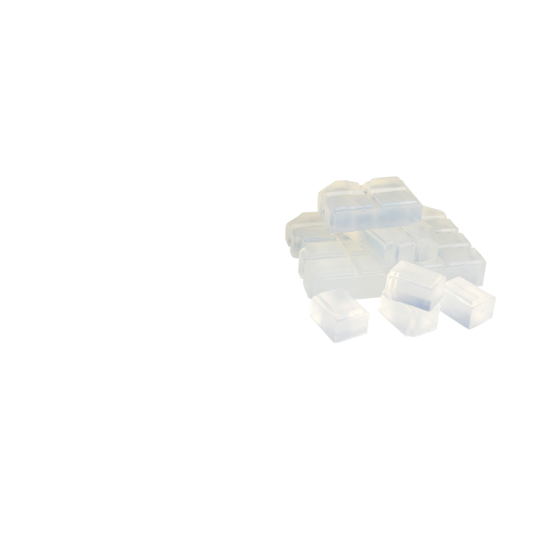 Stack of translucent glycerin blocks with a smooth, glossy surface on a white background