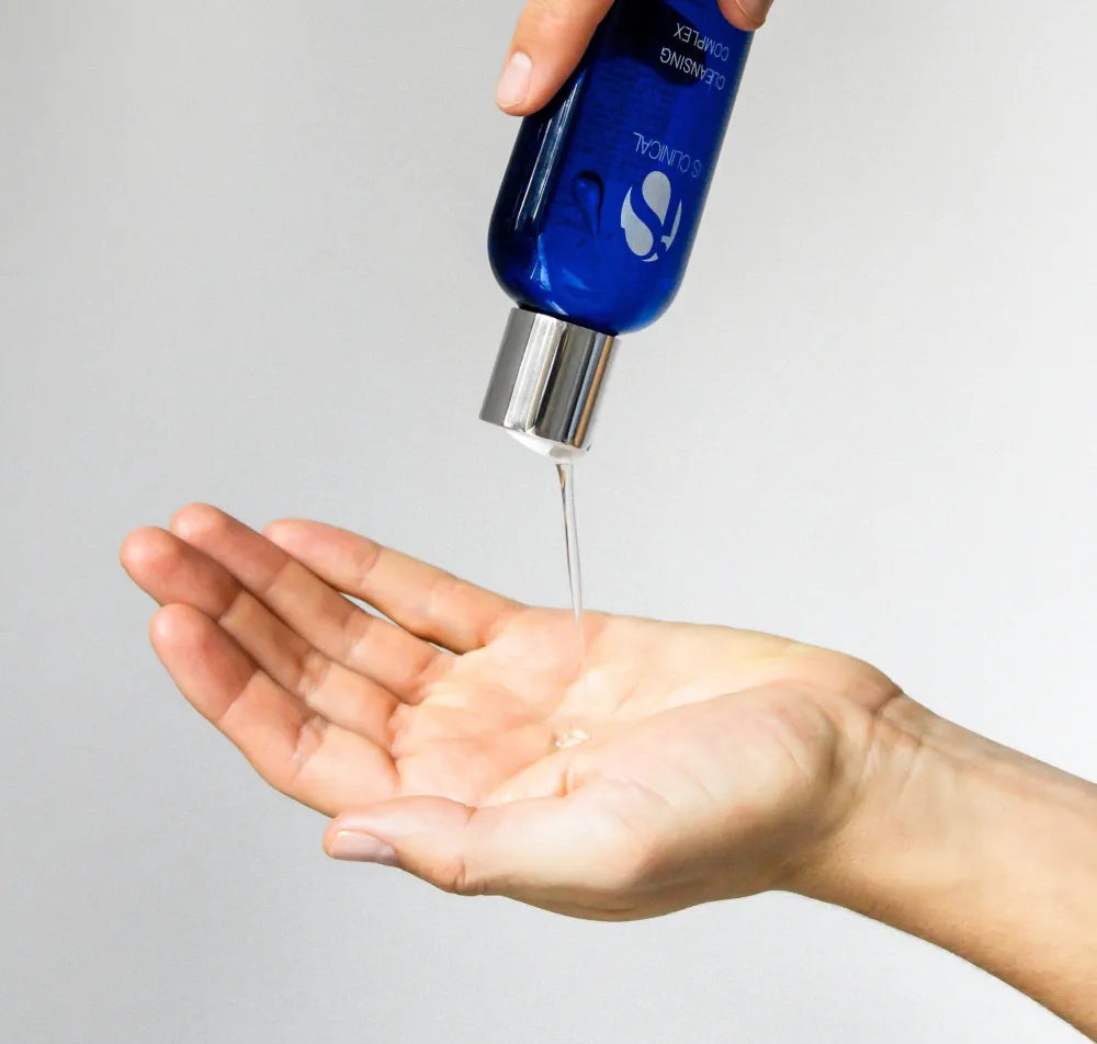 iS Clinical Cleansing Complex gel dispensed onto the hand