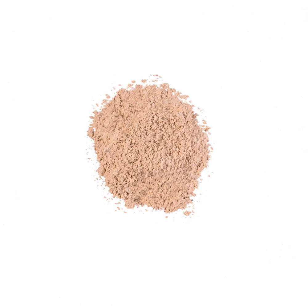 Loose beige powder of iS Clinical PerfecTint Powder SPF 40 on white background