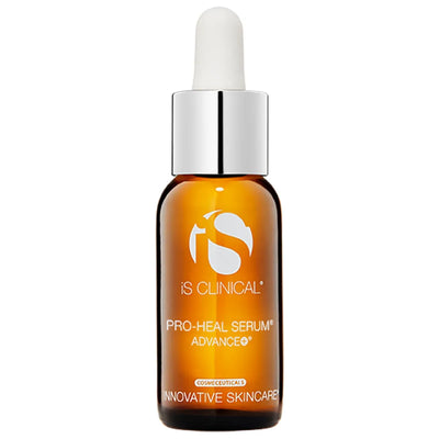 Amber glass dropper bottle of iS Clinical Pro-Heal Serum Advance+ with silver cap on white background